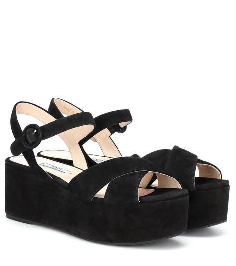 prada black suede platform sandals.